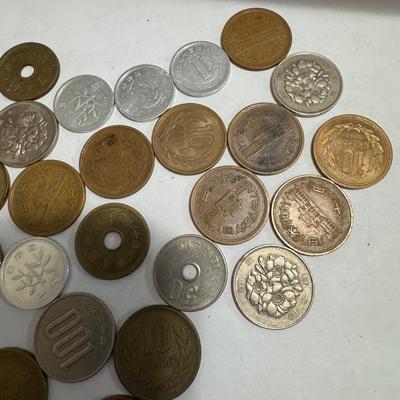 Collection of various foreign coins.