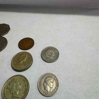 Collection of various foreign coins.