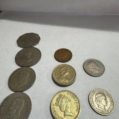 Collection of various foreign coins.