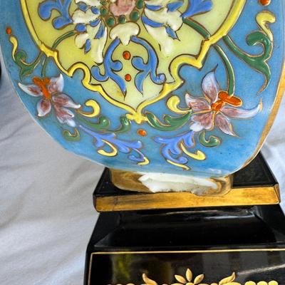 Sale Photo Thumbnail #123: Window large vintage bottle collection , white swung vase. Patterned decanter . Bottle stoppers not matching bottles. Blue Chinese vase with flaws. Teak lazy Susan with "legs" nut cracker and fish box. Patterned gold and red leather portfolio cover. Leath