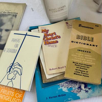 Sale Photo Thumbnail #192: Religious sterling silver Jerusalem cross Pendant with chain with  Amethyst stone, Bibles ceramic nun reading Bible, Nun doll, praying hands, MCM religious texts 5 Bibles. Some writing and a top stain noted.