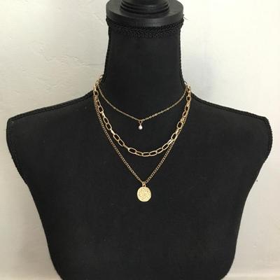 Cute, gold tone fashion, multi layered necklace