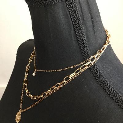 Cute, gold tone fashion, multi layered necklace