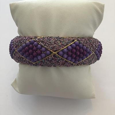 Gold tone purple clamp bracelet