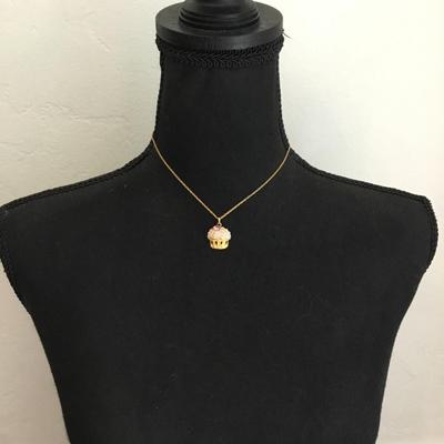 Butler, very nice cupcake necklace very beautiful