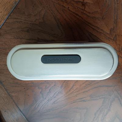 ALARM CLOCK WITH CALENDAR, PORTABLE READER SYSTEM AND A SURGE TAP