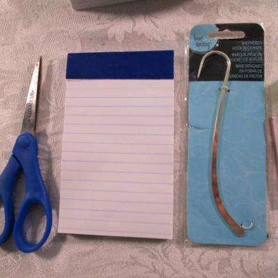 Sale Photo Thumbnail #267: Note pads, #10 envelopes, post-it notes, staples, Helllo Kitty business card holder, bookmark, tablet, post-it flags, scissors, paper clips, pencil sharpener, license plate name plate, stylus