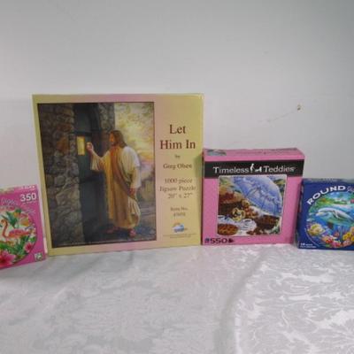 Sale Photo Thumbnail #513:  Two are 350 pieces, one is 550 pieces, Greg Olsen puzzle is 1000 pieces