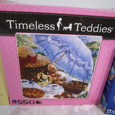 Sale Photo Thumbnail #516:  Two are 350 pieces, one is 550 pieces, Greg Olsen puzzle is 1000 pieces