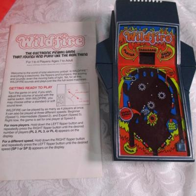 Sale Photo Thumbnail #543: Wildfire is an electronic pinball game takes 6 AA batteries not included, Bank Shot is an Electronic pool game takes 6 AA batteries not included, tested and both work