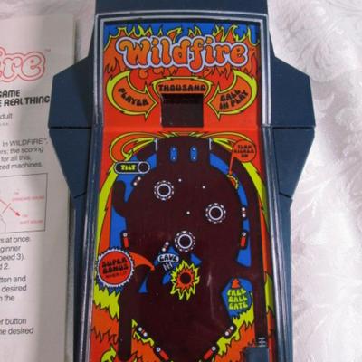 Sale Photo Thumbnail #544: Wildfire is an electronic pinball game takes 6 AA batteries not included, Bank Shot is an Electronic pool game takes 6 AA batteries not included, tested and both work