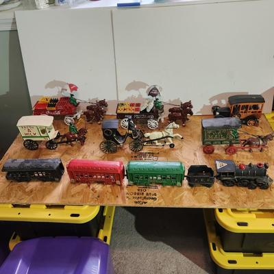 Lot of 7 Cast Iron Toys Milk Wagon, Truck, U.S. Mail, Produce Wagon, Carriage, Coca-Cola Wagon, P.R.R. Train Set