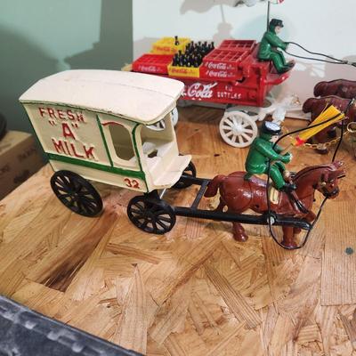 Lot of 7 Cast Iron Toys Milk Wagon, Truck, U.S. Mail, Produce Wagon, Carriage, Coca-Cola Wagon, P.R.R. Train Set