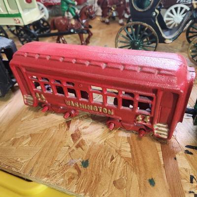 Lot of 7 Cast Iron Toys Milk Wagon, Truck, U.S. Mail, Produce Wagon, Carriage, Coca-Cola Wagon, P.R.R. Train Set