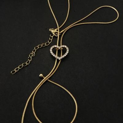 Gold tone heart rhinestone slider necklace
