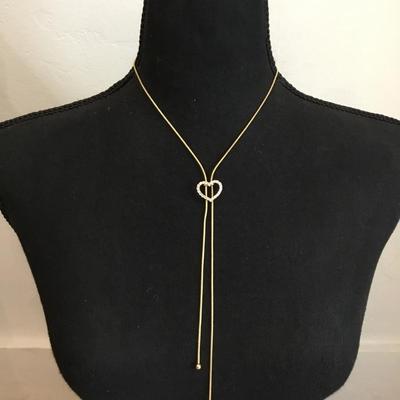 Gold tone heart rhinestone slider necklace