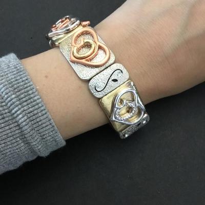 Very nice gold & silver toned stretch bracelet