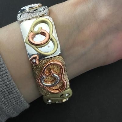 Very nice gold & silver toned stretch bracelet