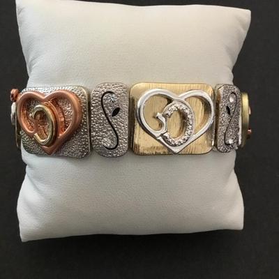 Very nice gold & silver toned stretch bracelet