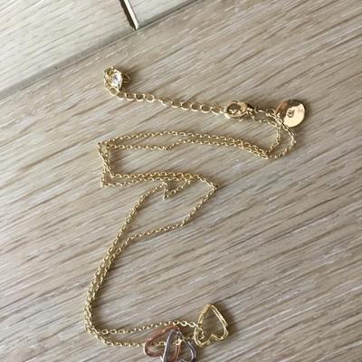 Beautiful very nice gold silver and rose. Gold toned marked CN necklace. Very nice.