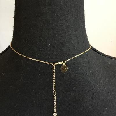 Beautiful very nice gold silver and rose. Gold toned marked CN necklace. Very nice.