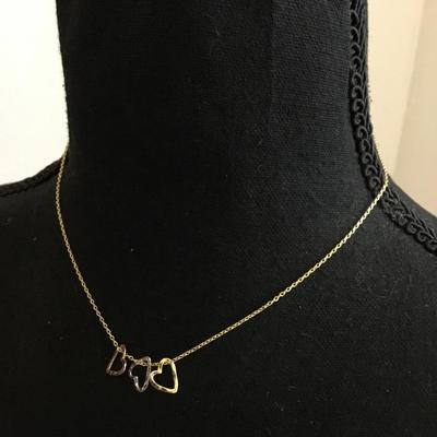 Beautiful very nice gold silver and rose. Gold toned marked CN necklace. Very nice.