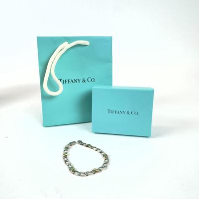 1066 TIFFANY & CO 18k and Sterling Figaro Link Bracelet