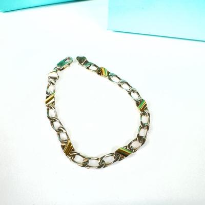 1066 TIFFANY & CO 18k and Sterling Figaro Link Bracelet