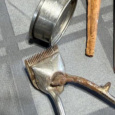 Vintage items, flour tester, collapsible metal cup, hair clipper, Jar wrench tool.