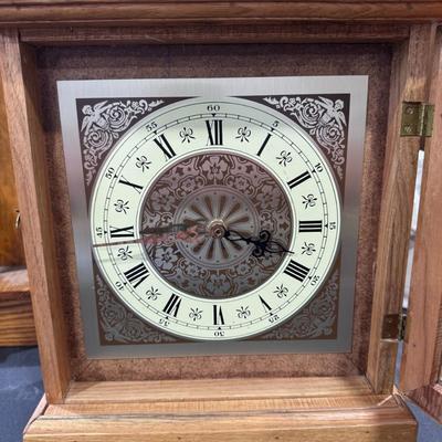 Wood cased mantel clock