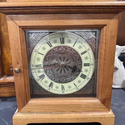 Wood cased mantel clock