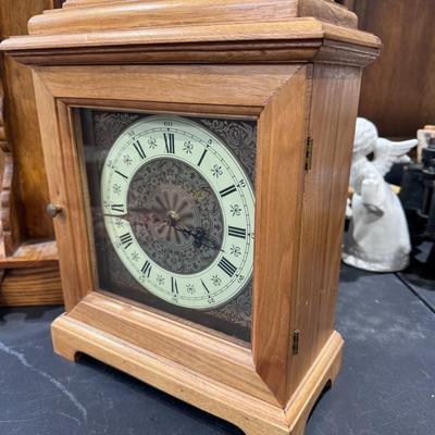 Wood cased mantel clock