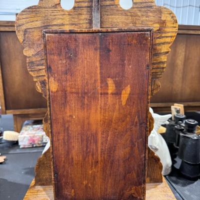 "Gingerbread" clock produced by the Waterbury Clock Company