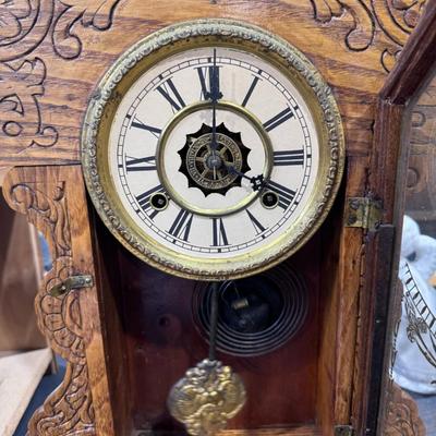"Gingerbread" clock produced by the Waterbury Clock Company