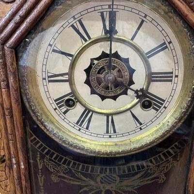 "Gingerbread" clock produced by the Waterbury Clock Company