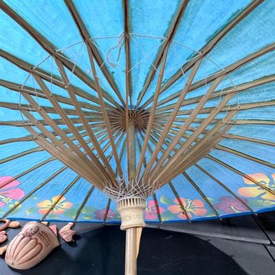 Japanese paper parasol decorated with hibiscus flowers