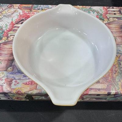 Pyrex casserole dish in the Butterfly Gold pattern.