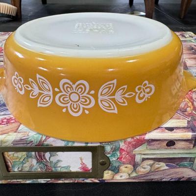 Pyrex casserole dish in the Butterfly Gold pattern.