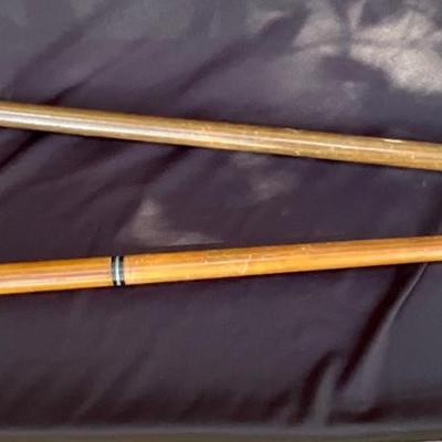 Vintage walking canes, one with brass handle