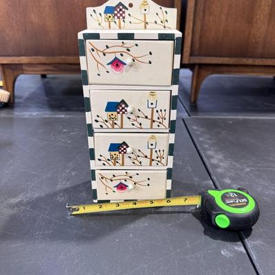 Cabinet or jewelry box featuring a hand-painted birdhouse and bird design