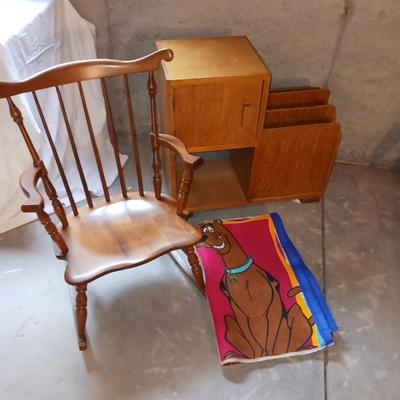 A CHILD'S ROCKING CHAIR, SCOOBY DOO BLANKET AND A SIDE TABLE WITH CABINET AND MAGAZINE HOLDER