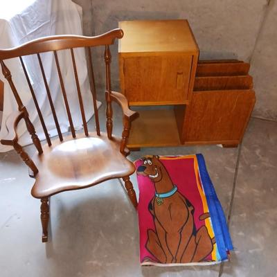 A CHILD'S ROCKING CHAIR, SCOOBY DOO BLANKET AND A SIDE TABLE WITH CABINET AND MAGAZINE HOLDER