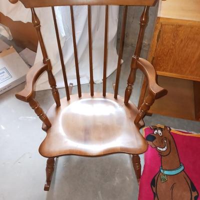 A CHILD'S ROCKING CHAIR, SCOOBY DOO BLANKET AND A SIDE TABLE WITH CABINET AND MAGAZINE HOLDER