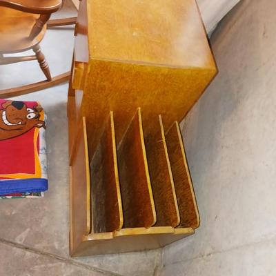 A CHILD'S ROCKING CHAIR, SCOOBY DOO BLANKET AND A SIDE TABLE WITH CABINET AND MAGAZINE HOLDER
