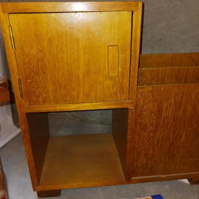 A CHILD'S ROCKING CHAIR, SCOOBY DOO BLANKET AND A SIDE TABLE WITH CABINET AND MAGAZINE HOLDER