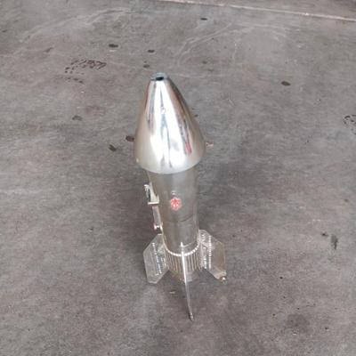 1957 ASTRO MFG BERZAC GUIDED MISSILE ROCKET TOY BANK (coins included, no key)
