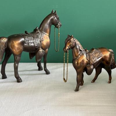 Two copper Horses