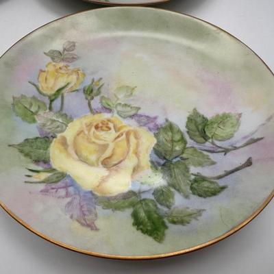 Set of 15 Hand-Painted Floral Porcelain Plates – Signed C. Farrington