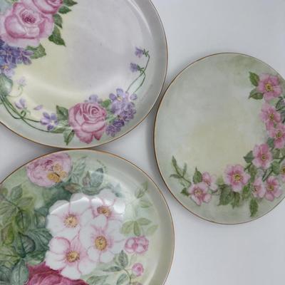 Set of 15 Hand-Painted Floral Porcelain Plates – Signed C. Farrington