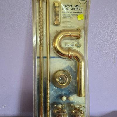 Gold toned sink kit